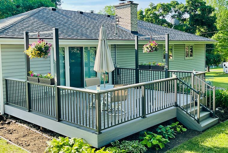 A maintenance free deck with multiple railings attached, built in Chanhassen, MN